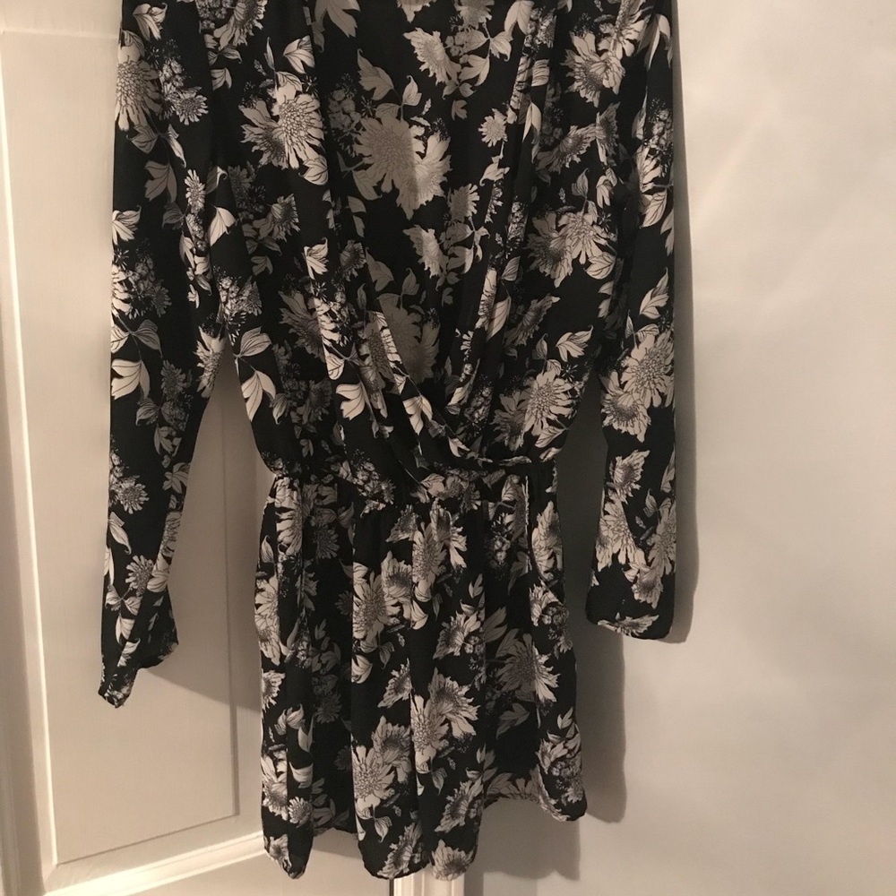LONG SLEEVED FLORAL ROMPER